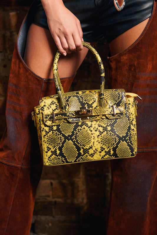 NEVER TYPICAL SNAKE PRINT PURSE
