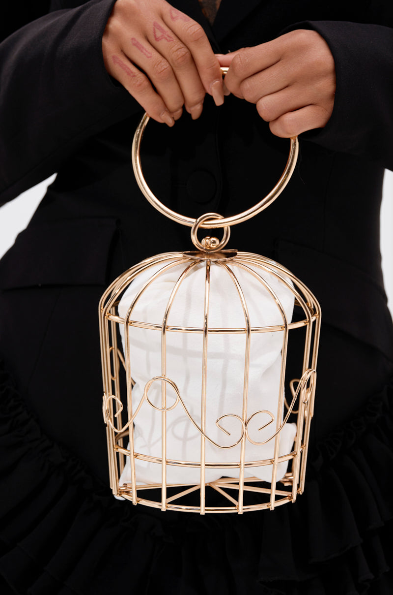 NEVER CAGED PURSE