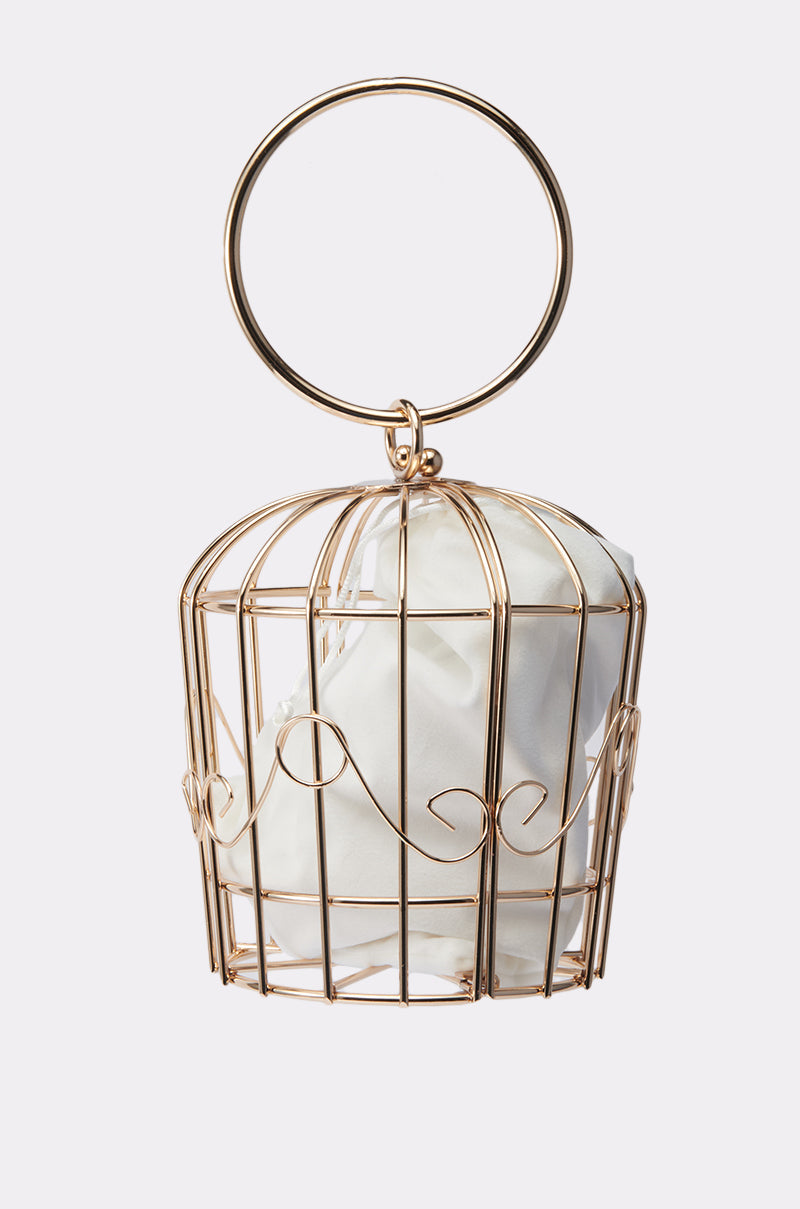 NEVER CAGED PURSE